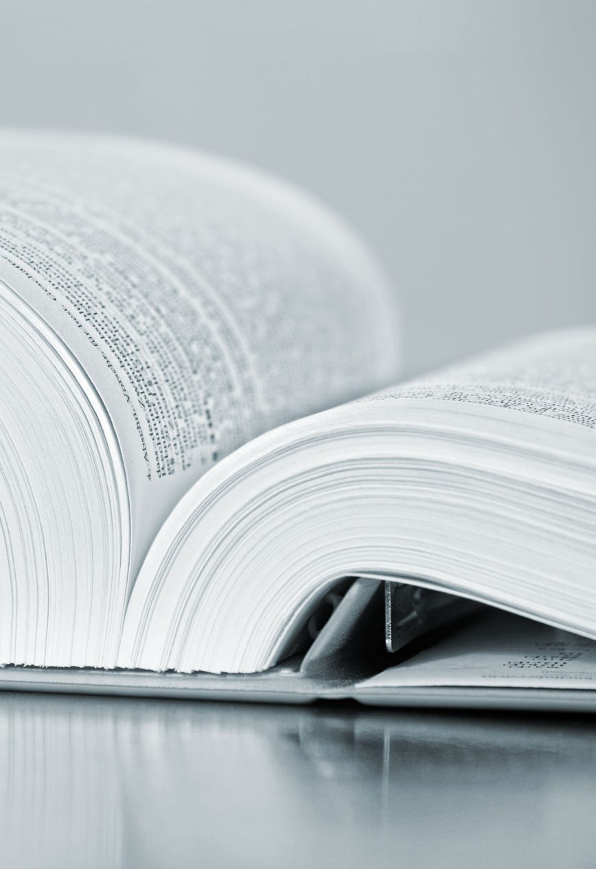 Abbildung aufgeschlagenes Gesetzbuch, Erbrecht, Testamentsvollstreckung